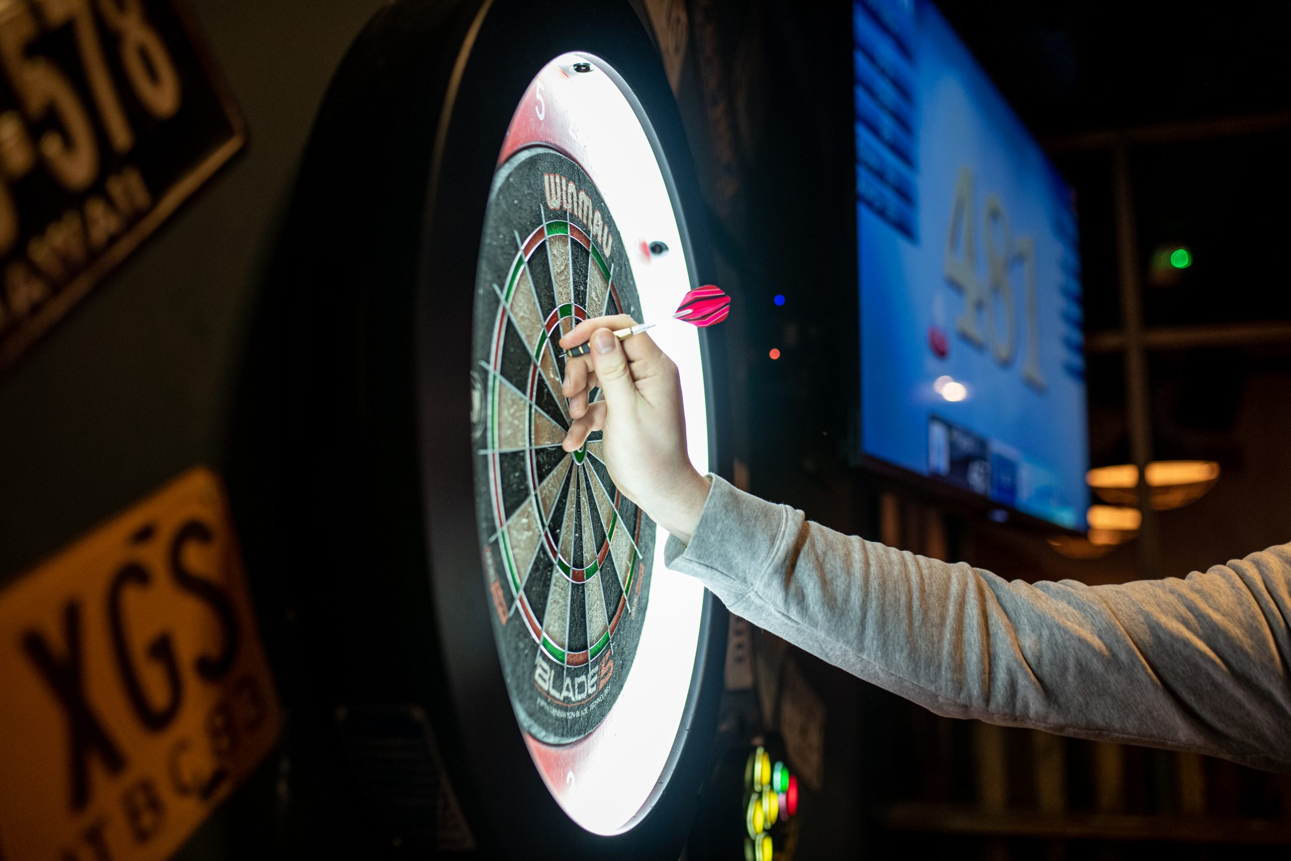 Enjoy a game of darts with friends at Firepit bars